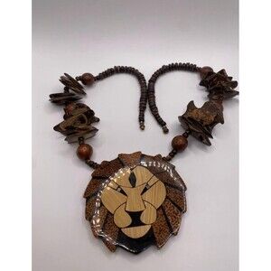 Wood Beaded Necklace by designer Lee Sands . Lion Face Animal Charm Pendant, by